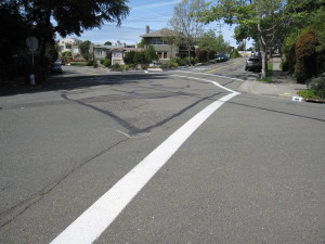 Crosswalks and new triangle help pedestrians cross the intersection